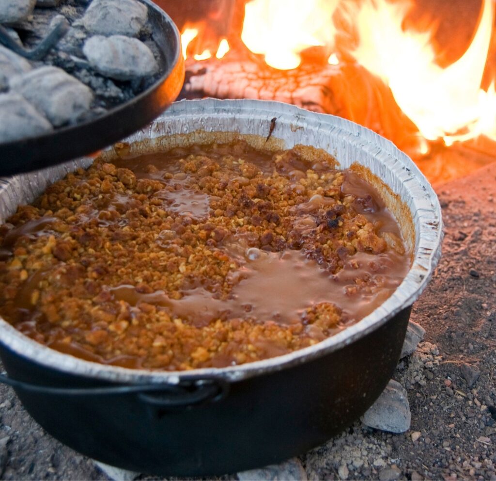 Photo of cowboy baked beans in pot to illustrate Chuckwagon Cooking Recipes