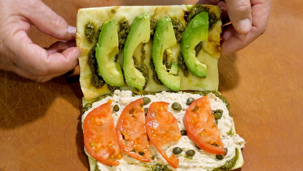TikTok Tunacado Sandwich assembly with avocado and tomato